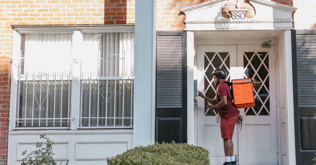 locksmith unlocking front door — Maple Guard Locksmith Hamilton